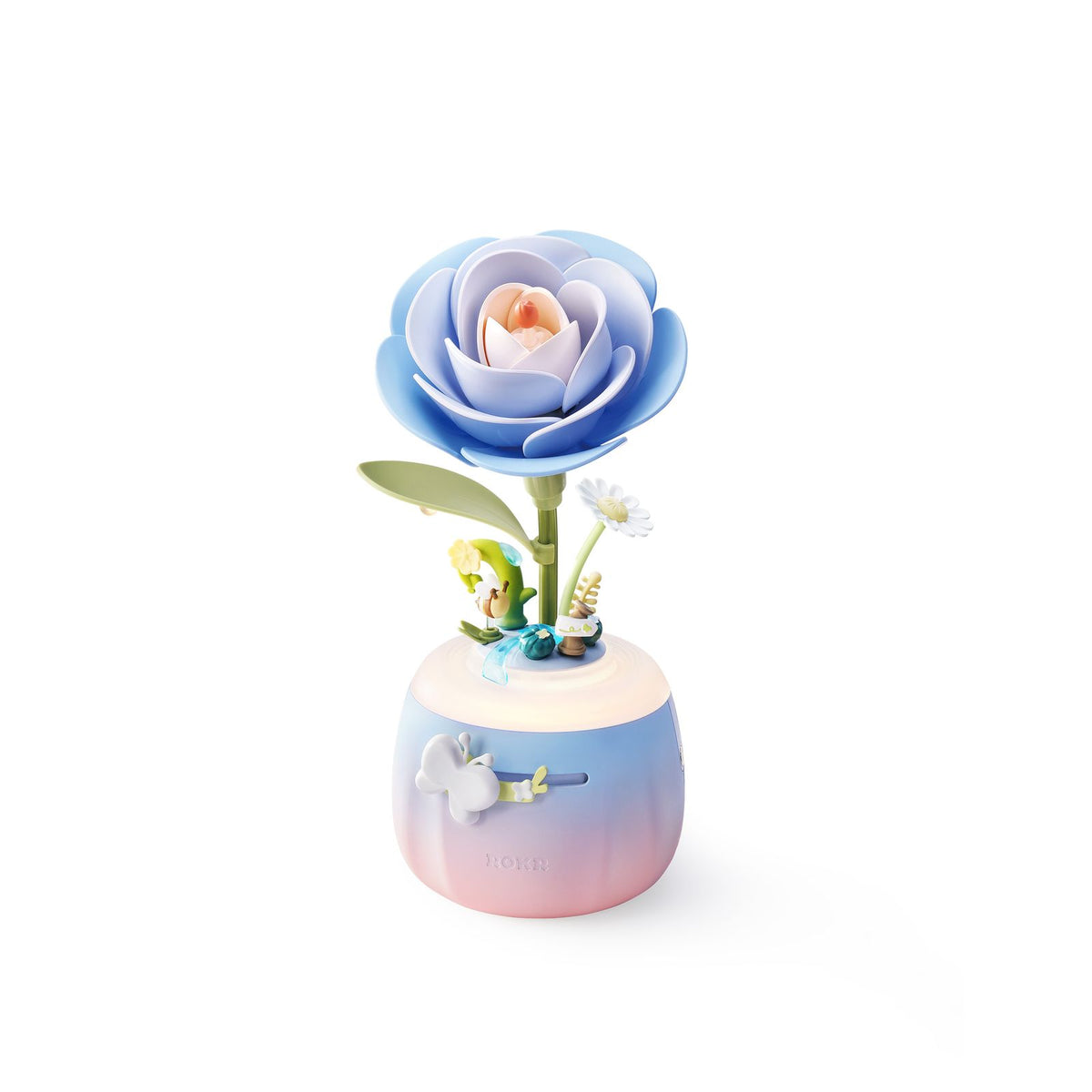 Leuchtende Starry Camellia Lamp als LED Nachttischlampe im abgedunkelten Raum