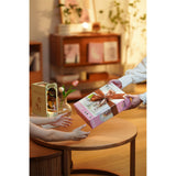 Rolife Holzbausatz Falling Sakura: Puzzleteile aus Holzplatten und Aufkleber