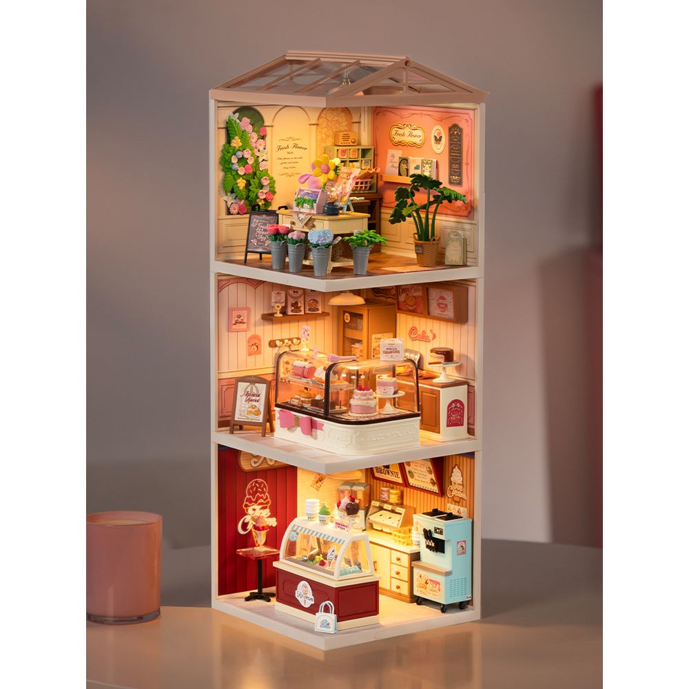 Antiker Blechtisch mit Blumen und Margeriten im Rolife Miniaturhaus Blumenladen