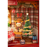 Detailansicht Geschirrschrank, Teppich und Weihnachtskranz im Diorama Bausatz Weihnachten