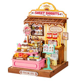 Rolife DIY Miniaturhaus Sweetie’s Donut Shop DS051 fertig aufgebaut mit rosa Theke