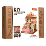 Miniaturhaus Geschenk: Rolife Sweetie’s Donut Shop mit Maßen 9,6 × 9,6 × 13,8 cm