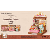 DIY Miniaturhaus für Erwachsene: Sweetie’s Donut Shop als Deko im Regal