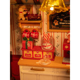 Rolife Gingerbread House DG176 Bausatz fertig aufgebaut in winterlicher Szene