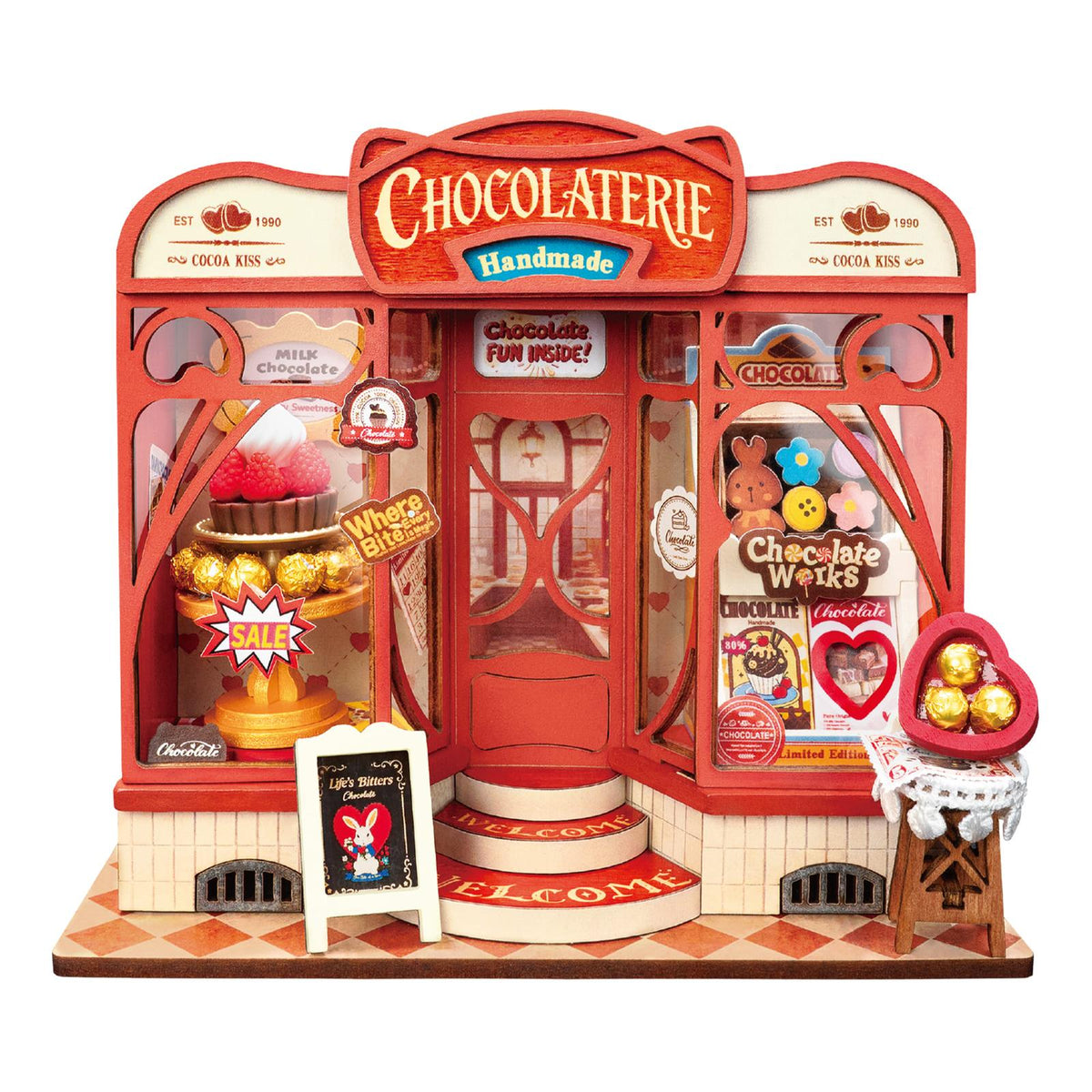 Schokoladenladen Bausatz mit Schaufenster, Schokoladenkuchen und Himbeeren