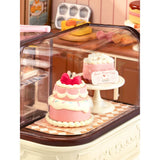 Rolife Miniaturhaus Tasty Cake Shop mit beweglichen Schranktüren zum Öffnen und Schließen