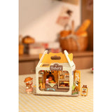 Miniaturhaus Bausatz Bärenbäckerei von Rolife, Vorderansicht mit Vitrine