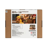 Bemalte Holzteile und Papierteile des Rolife Tipsy Restaurant Bausatzes