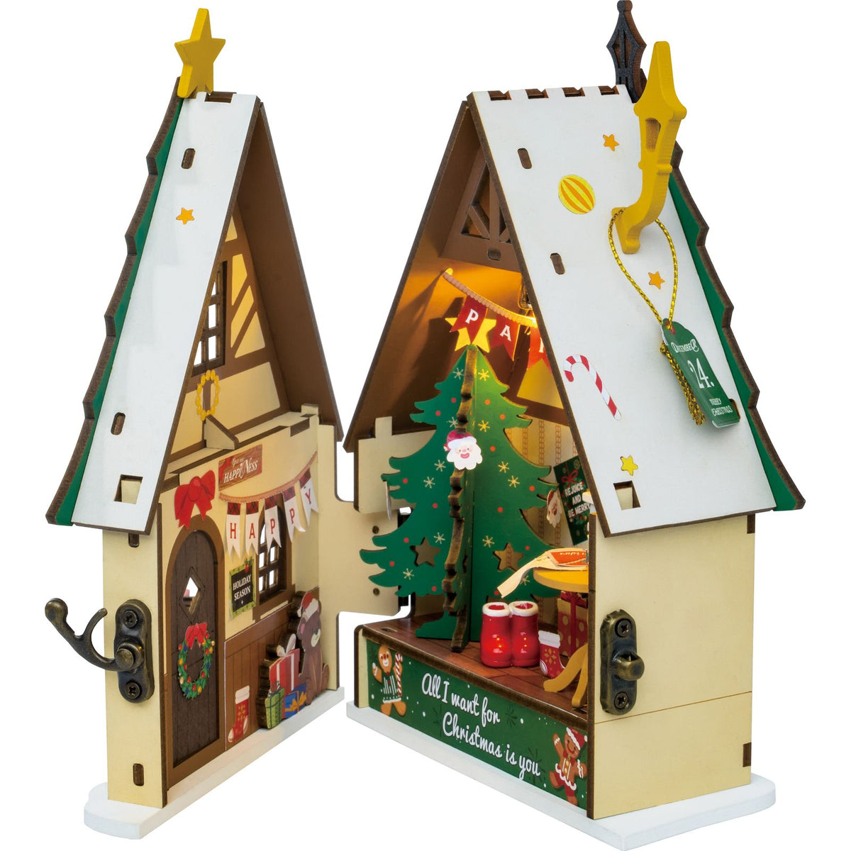 Weihnachtshaus Bausatz Rolife mit schneebedecktem Dach und Stern