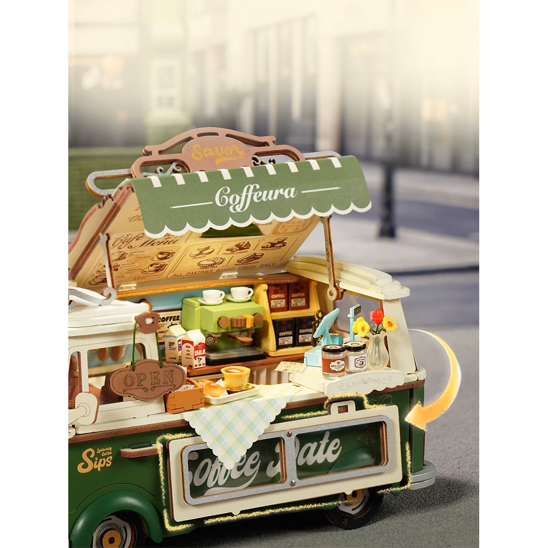 Theke mit Tasse Kaffee und Croissant im Leo's Coffee Truck Bausatz