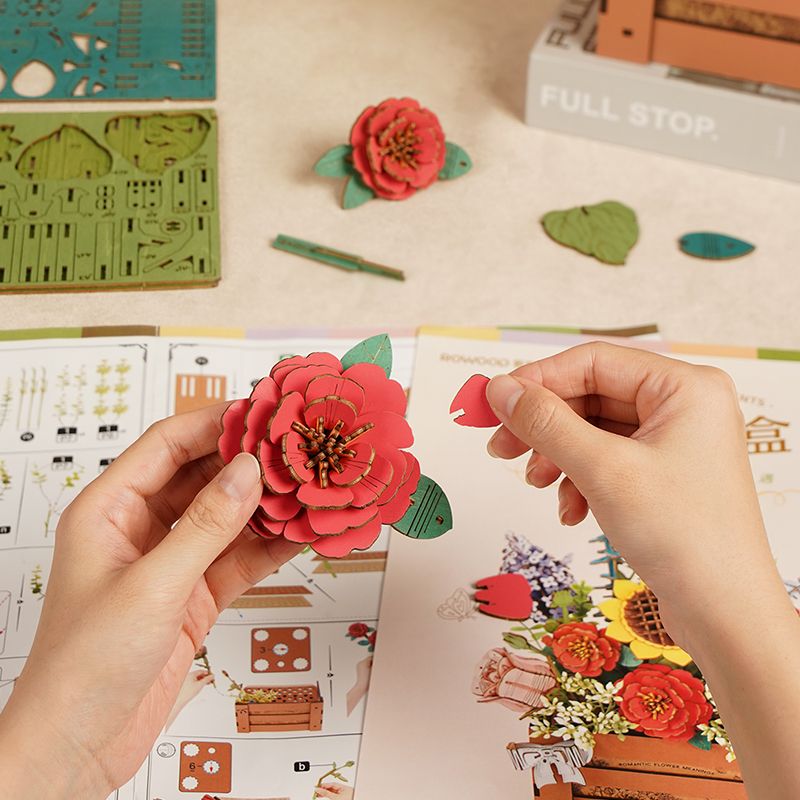 Schild mit inspirierendem Spruch an der Rowood Wooden Bloom Box