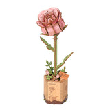 Rosa – Rowood Pink Rose Holzblumen Bausatz TW041 fertig aufgebaut im Blumentopf