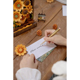 Holz Wandbild Bausatz Sonnenblumen von Rowood an der Wohnzimmerwand